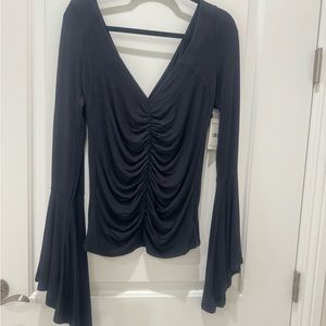Brand new Free People black Top, size Large